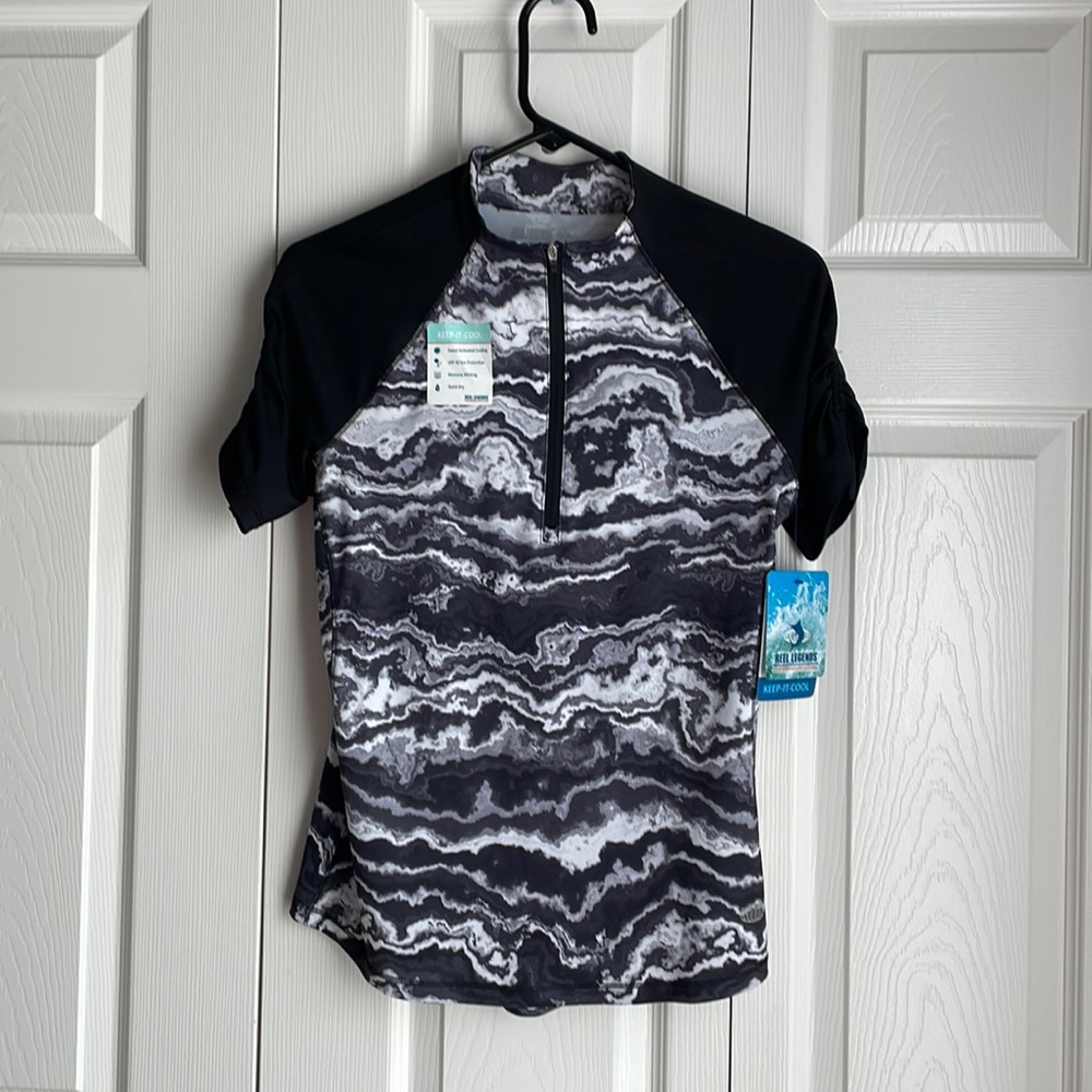 Woman’s Reel Legends Short sleeve Performance Top.